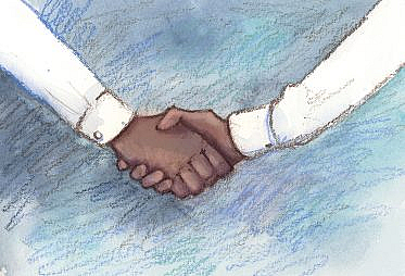 Two hands in white dress shirts shaking hands.